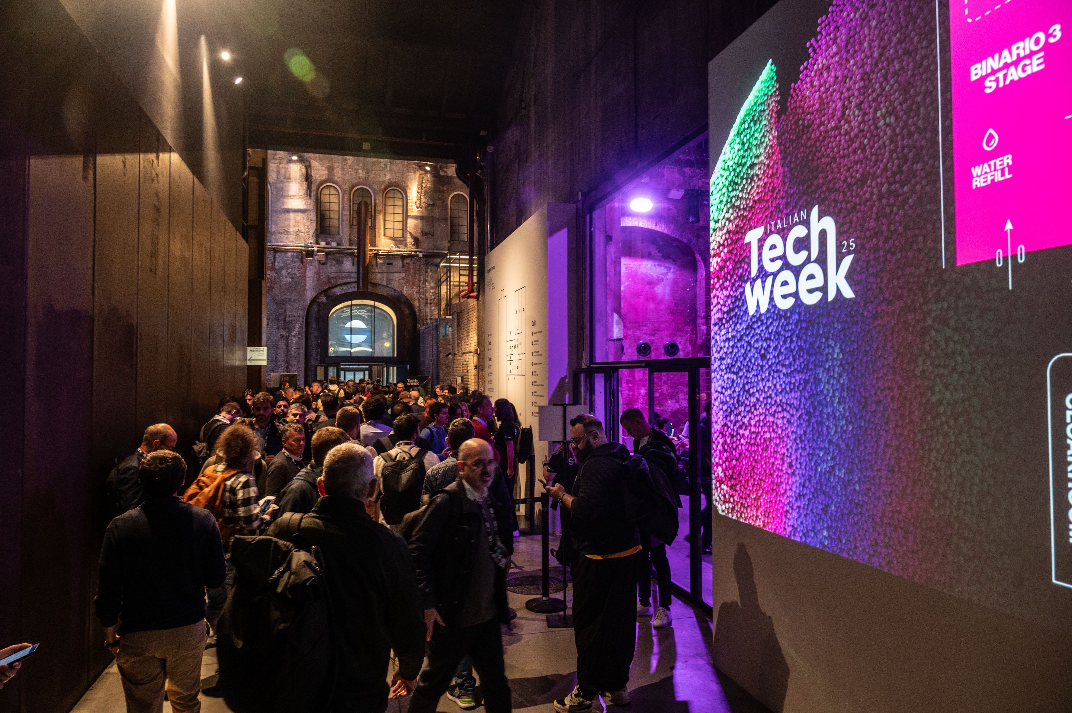 Check-in kiosks and personalized badges at Italian Tech Week 2024 in Turin